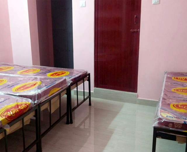 Four-Sharing AC and Non-AC Room at Kavitha’s Ladies Hostel Velachery